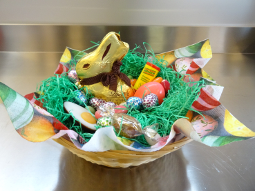 Osternest, komplett Ø 15 cm. - mit Goldhase Schoggi-Schwarz (11 cm.)