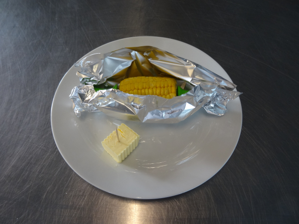 Maiskolben mit Butter