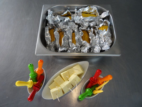 Maiskolben mit Butter